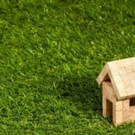 buy-to-let wooden figure house on the grass