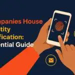 Hand holding smartphone displaying facial recognition for Companies House identity verification